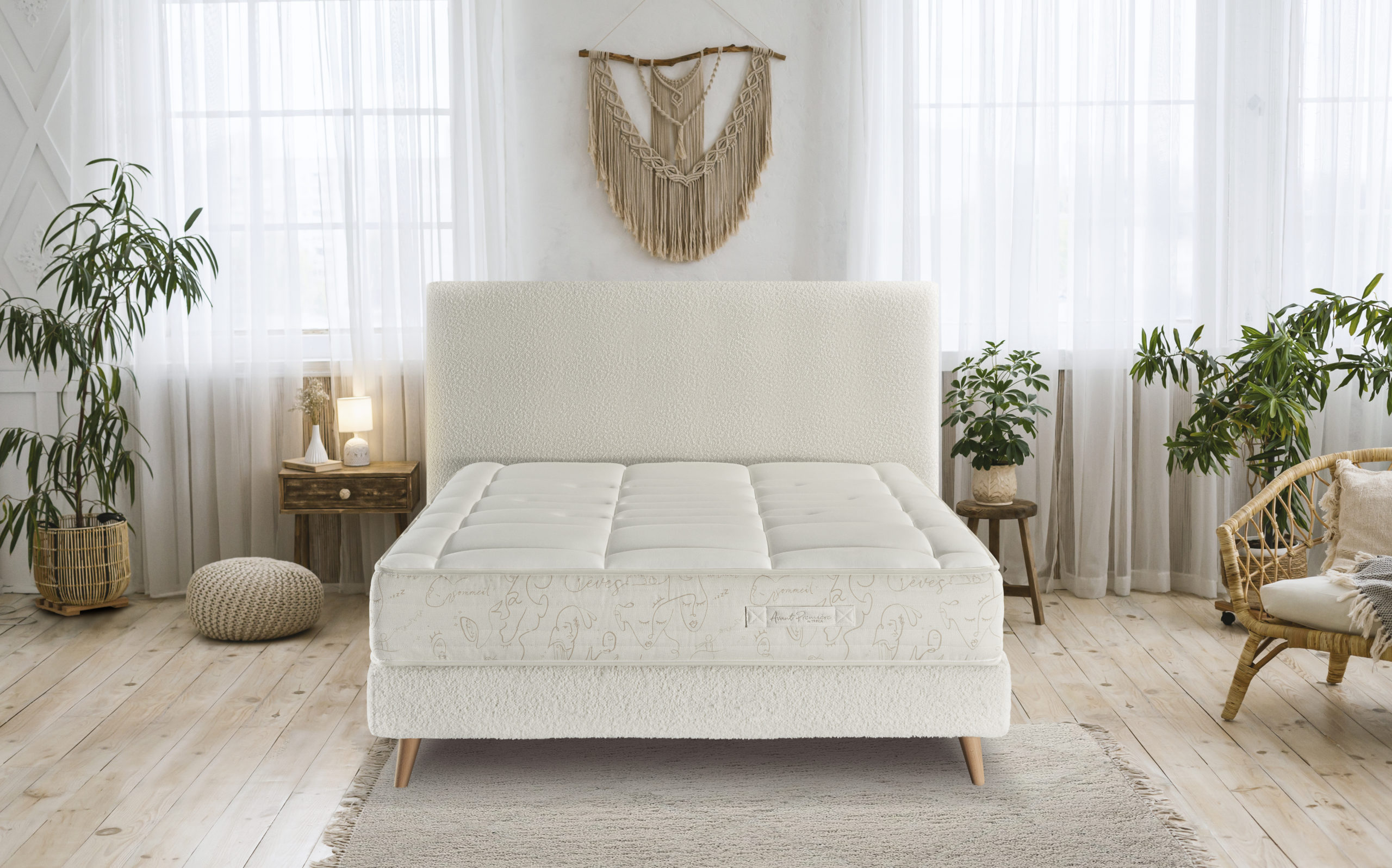 Rustic home design with ethnic boho decoration. Bed with pillows, wooden furniture
